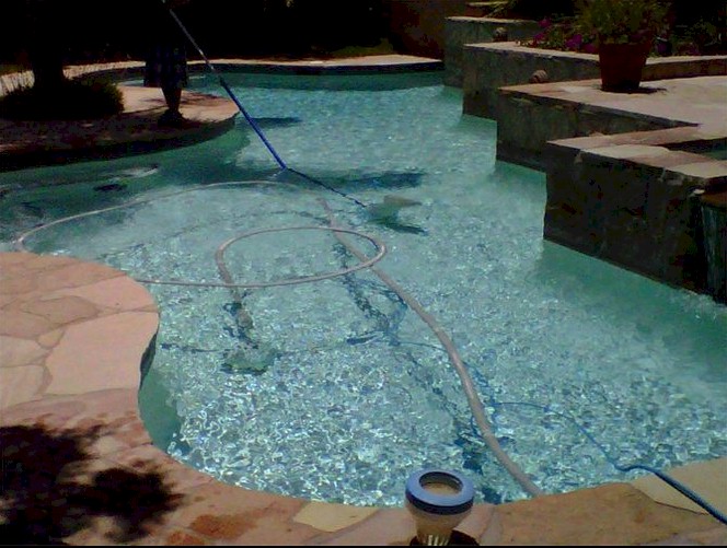 Polished Pools cleaning residential pool